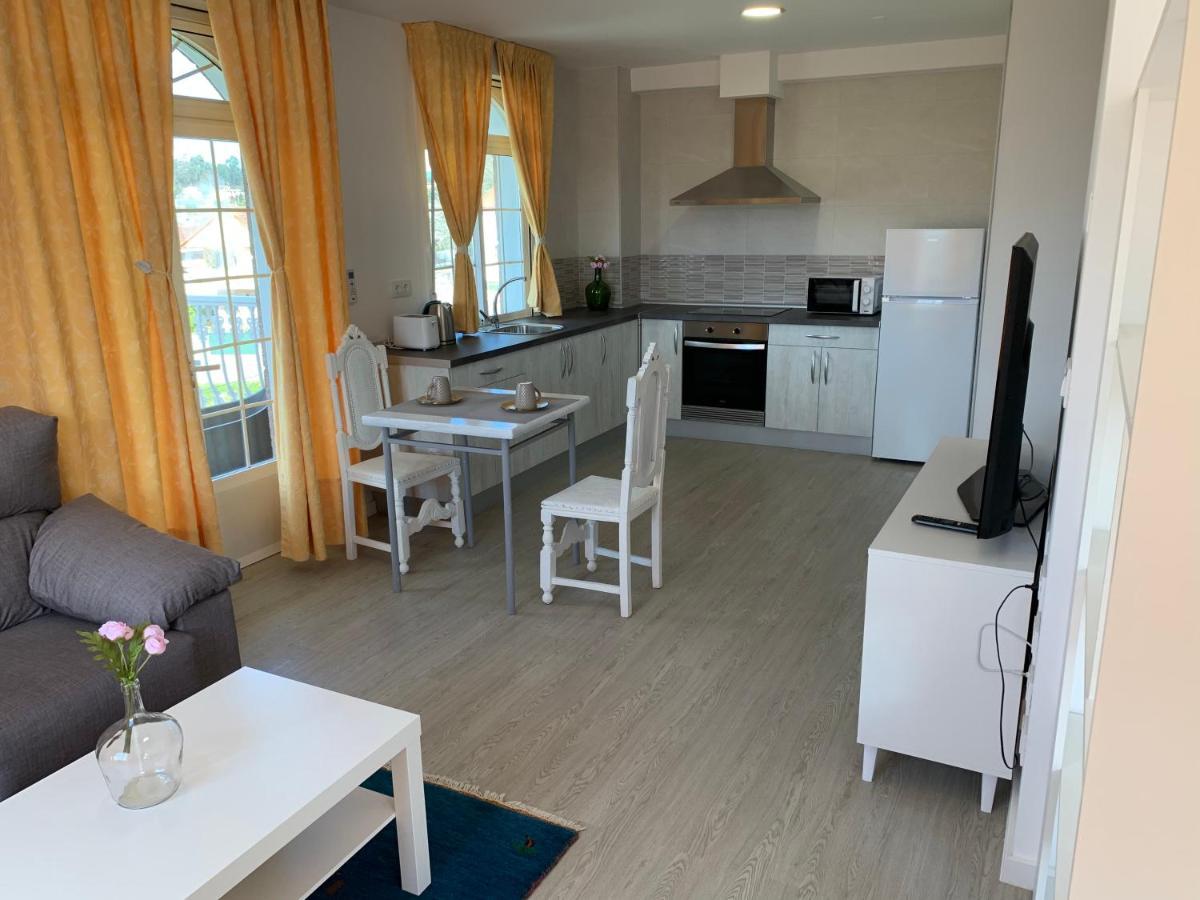 Apartamentos Sanjuan Порриньо Экстерьер фото